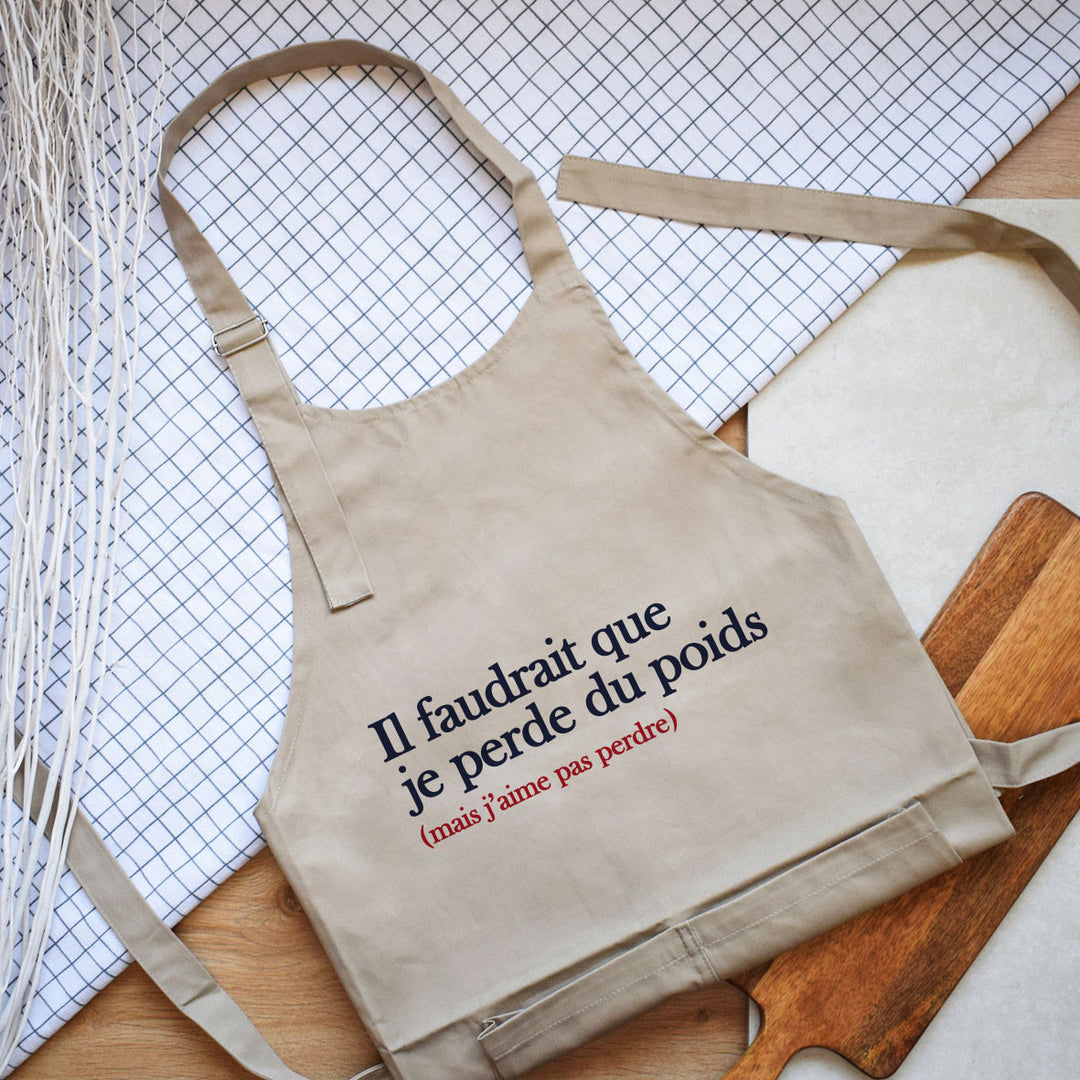 Tablier - Il faudrait perdre du poids